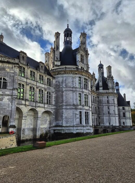 Chambord Castle viewed from the side across the formal gardens
